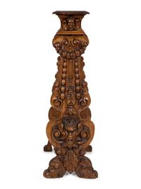 An Italian Renaissance Revival Carved Oak Sgabello Pedestal