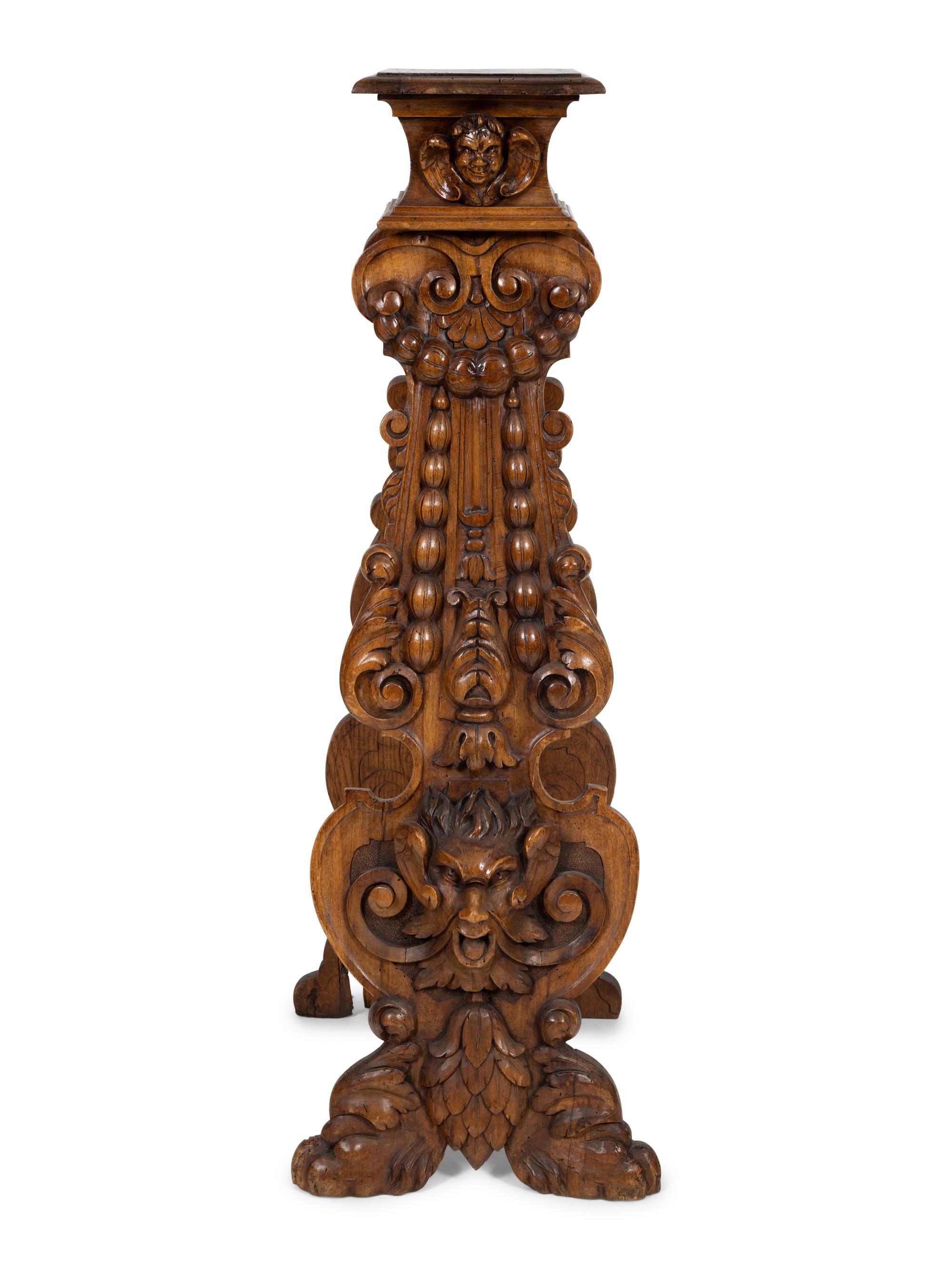 An Italian Renaissance Revival Carved Oak Sgabello Pedestal
