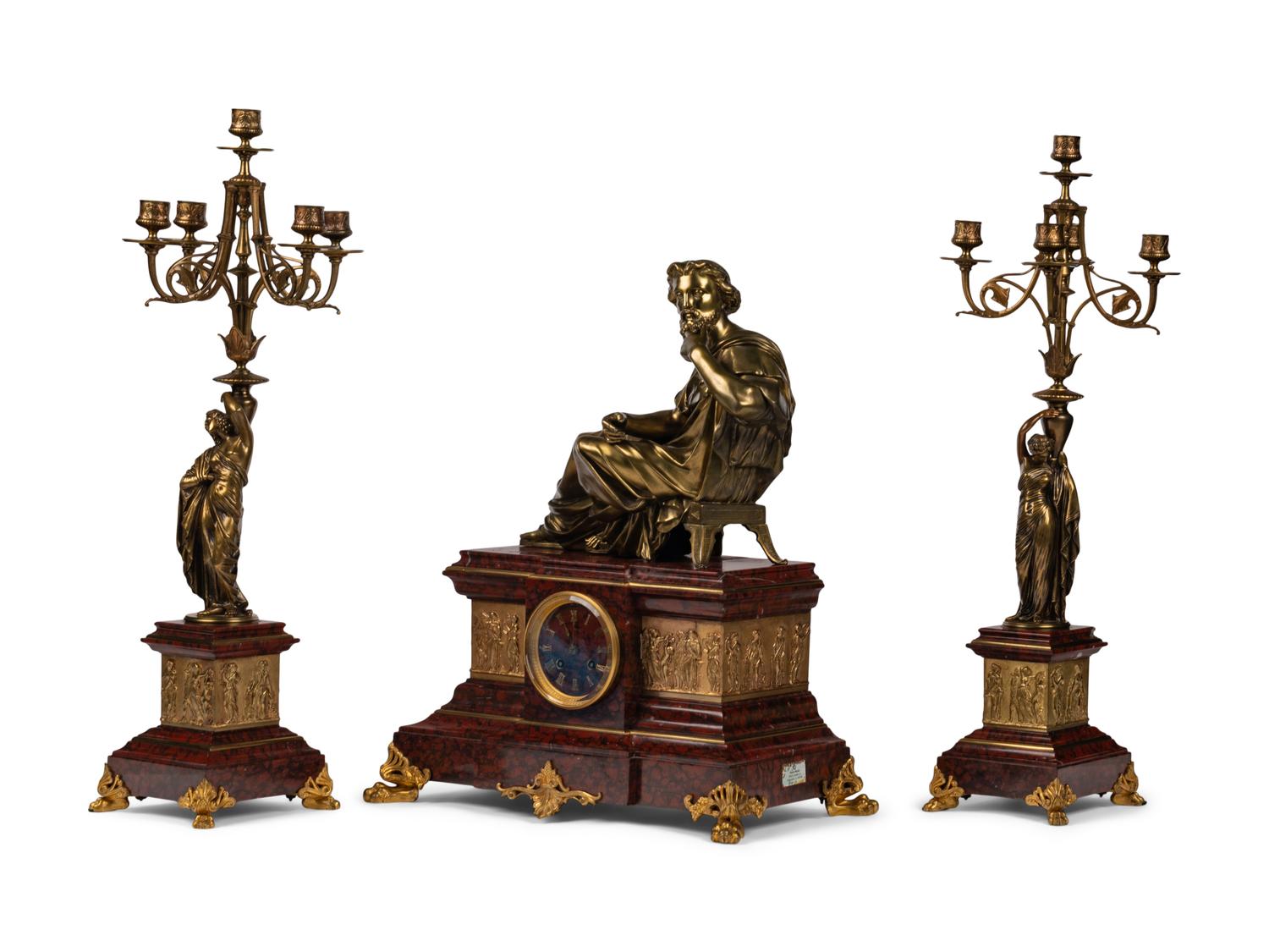 A French Neoclassical Gilt Bronze and Rouge Marble Clock Garniture