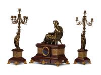 A French Neoclassical Gilt Bronze and Rouge Marble Clock Garniture