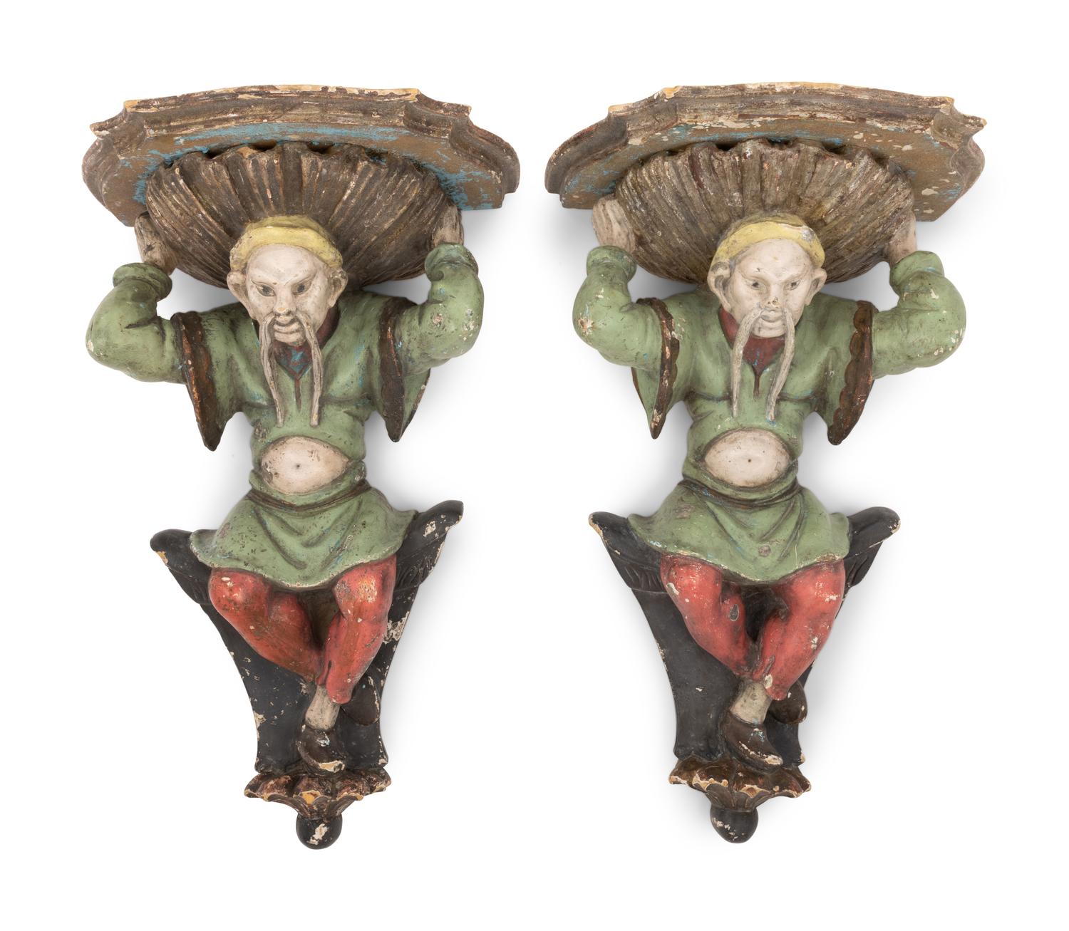 A Pair of Italian Carved and Polychrome Decorated Wood Figural Wall Brackets