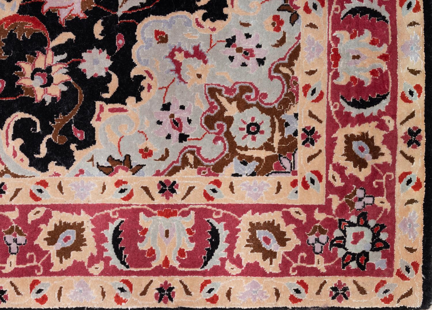 A Tabriz Wool Rug
