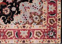 A Tabriz Wool Rug