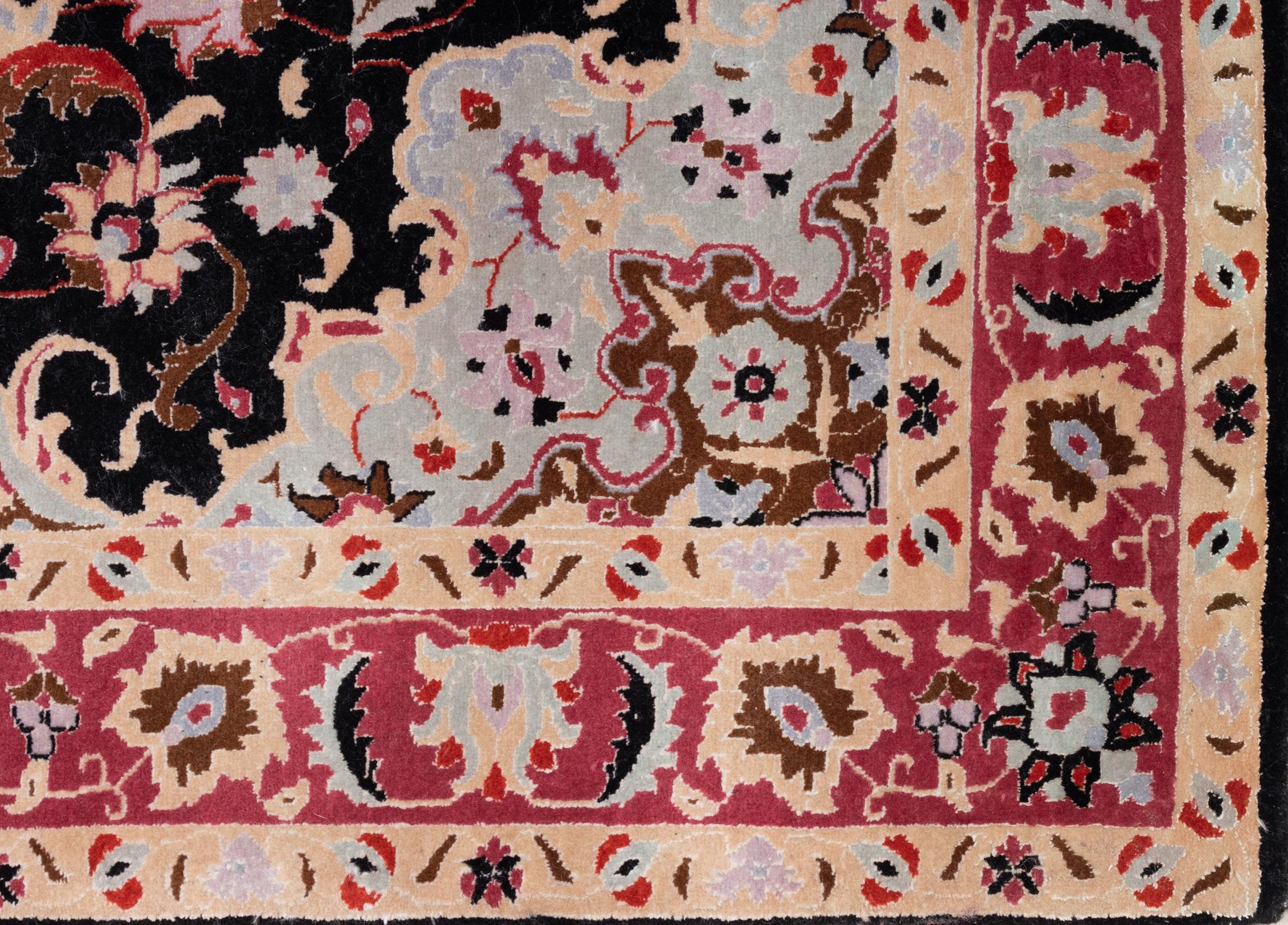 A Tabriz Wool Rug