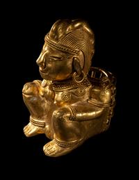 A Tairona Tumbaga Seated Female Figure