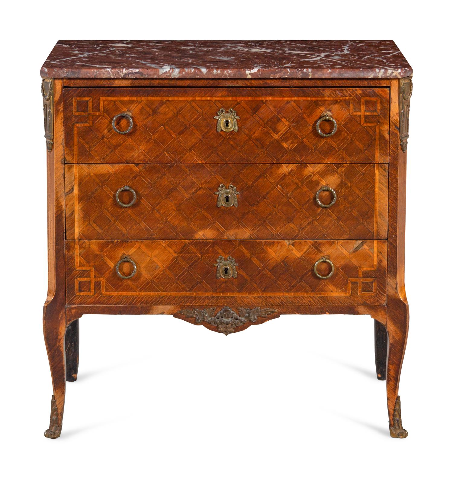A Louis XV/XVI Transitional Style Gilt Metal Mounted Parquetry Marble Top Commode