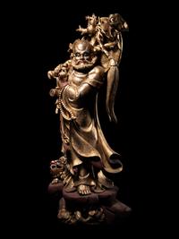 A Chinese Gilt Lacquered Wood Figure of Immortal