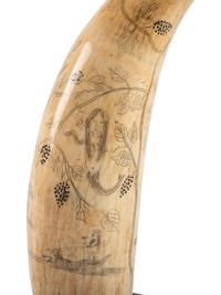 A Scrimshaw Whale's Tooth