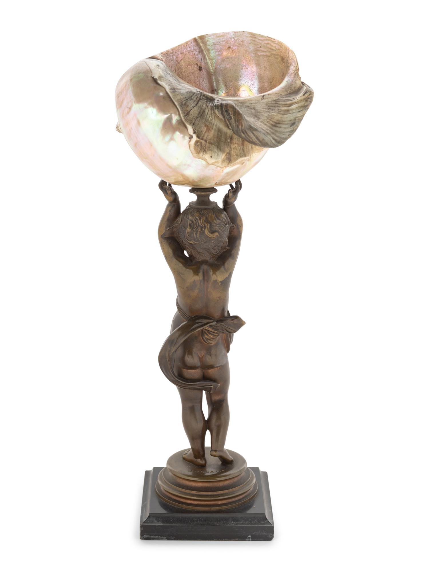 A Continental Bronze and Nautilus Shell Table Ornament