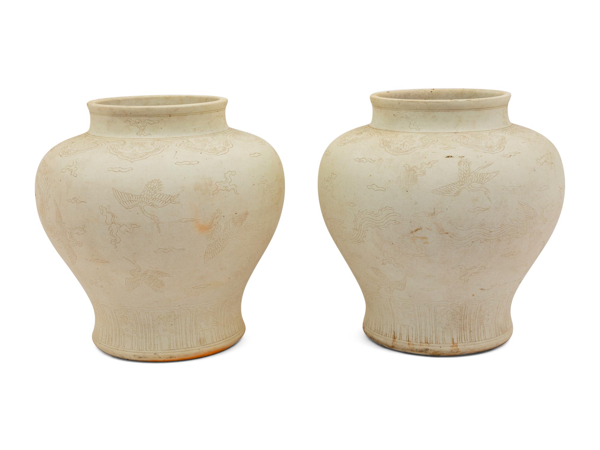 A Pair of Chinese Unglazed Biscuit Jars