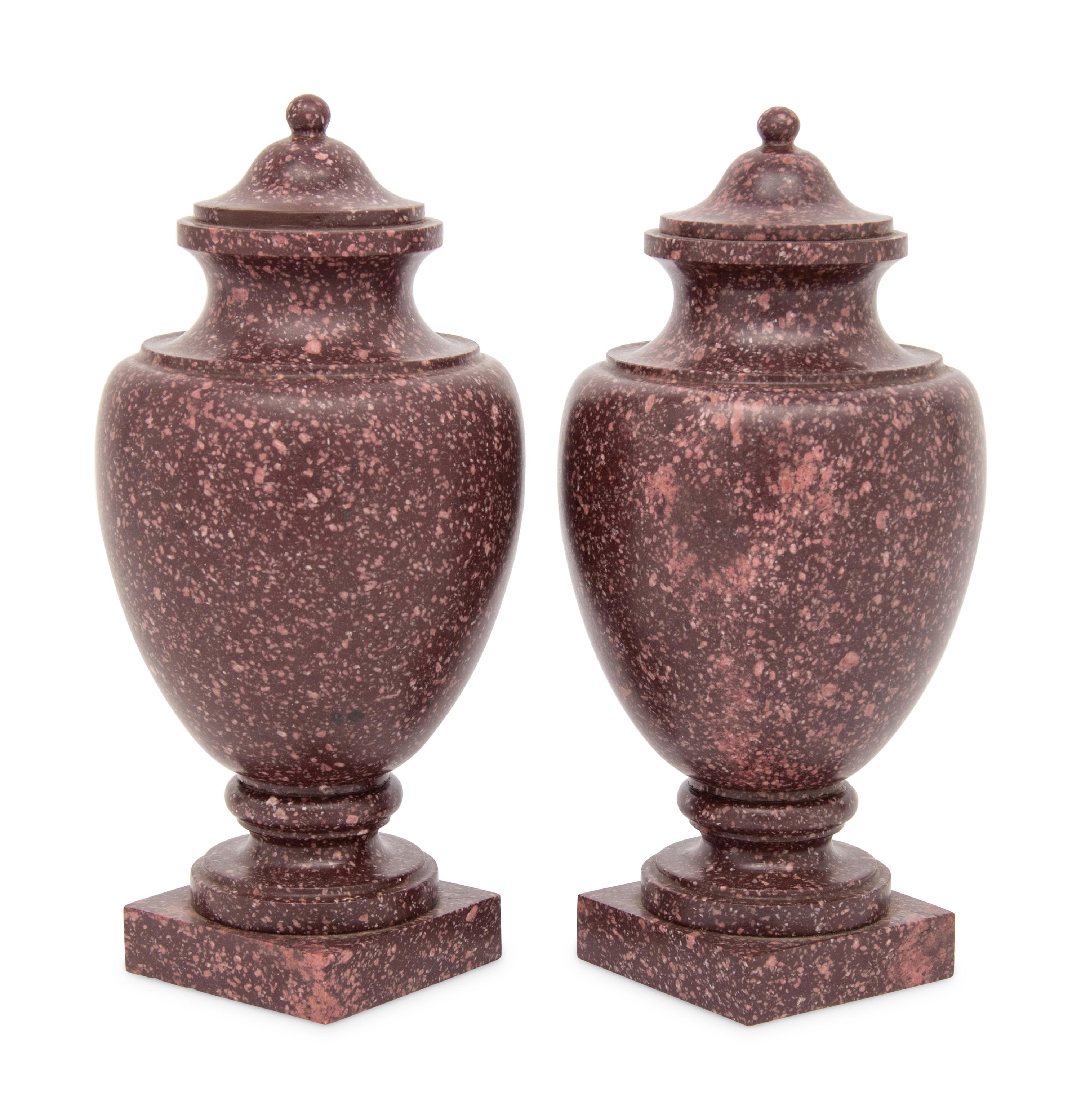 A Pair of Neoclassical Style Carved Porphyry Covered Urns