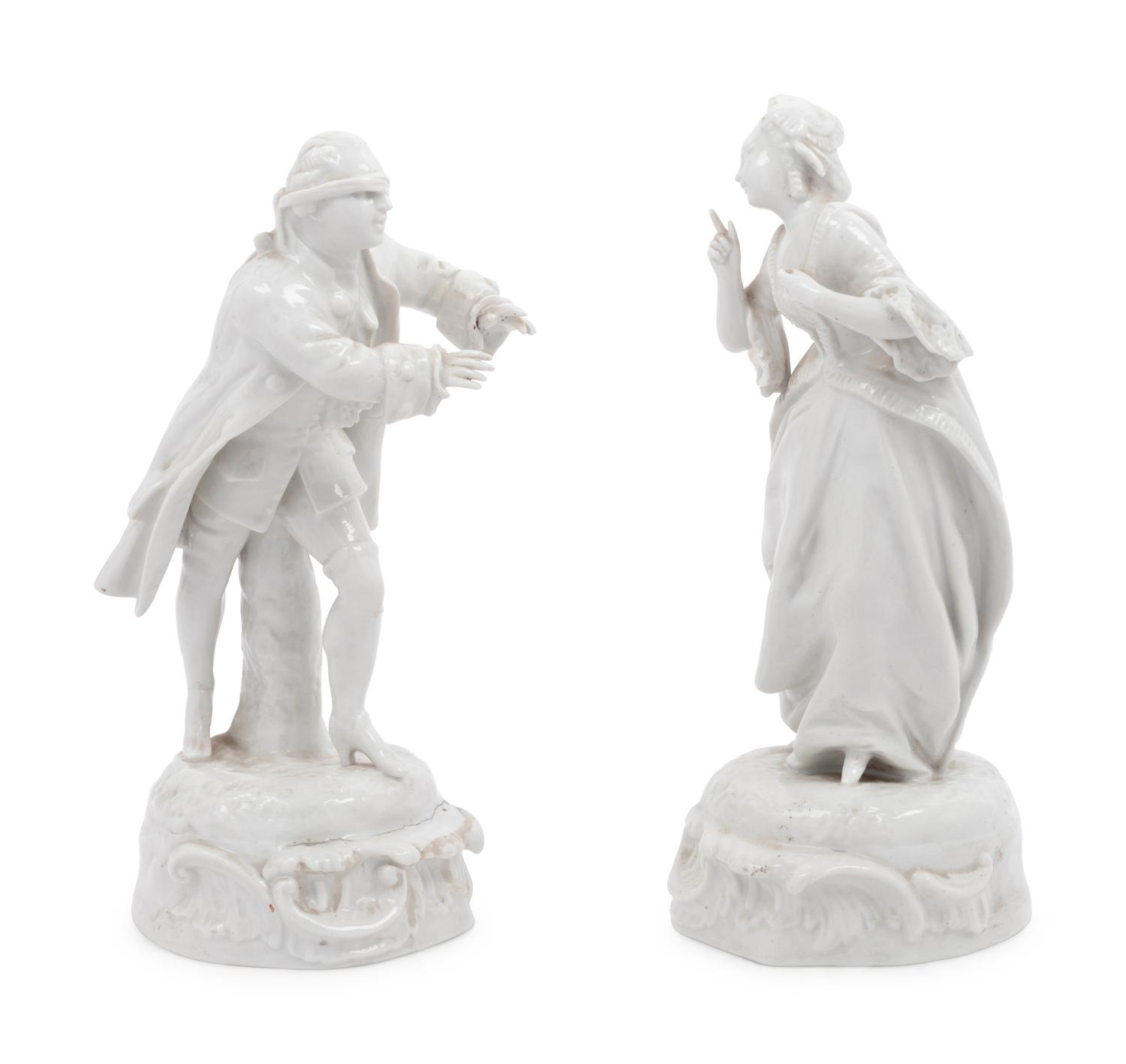 A Pair of French Blanc-de-Chine Hide and Seek Figures