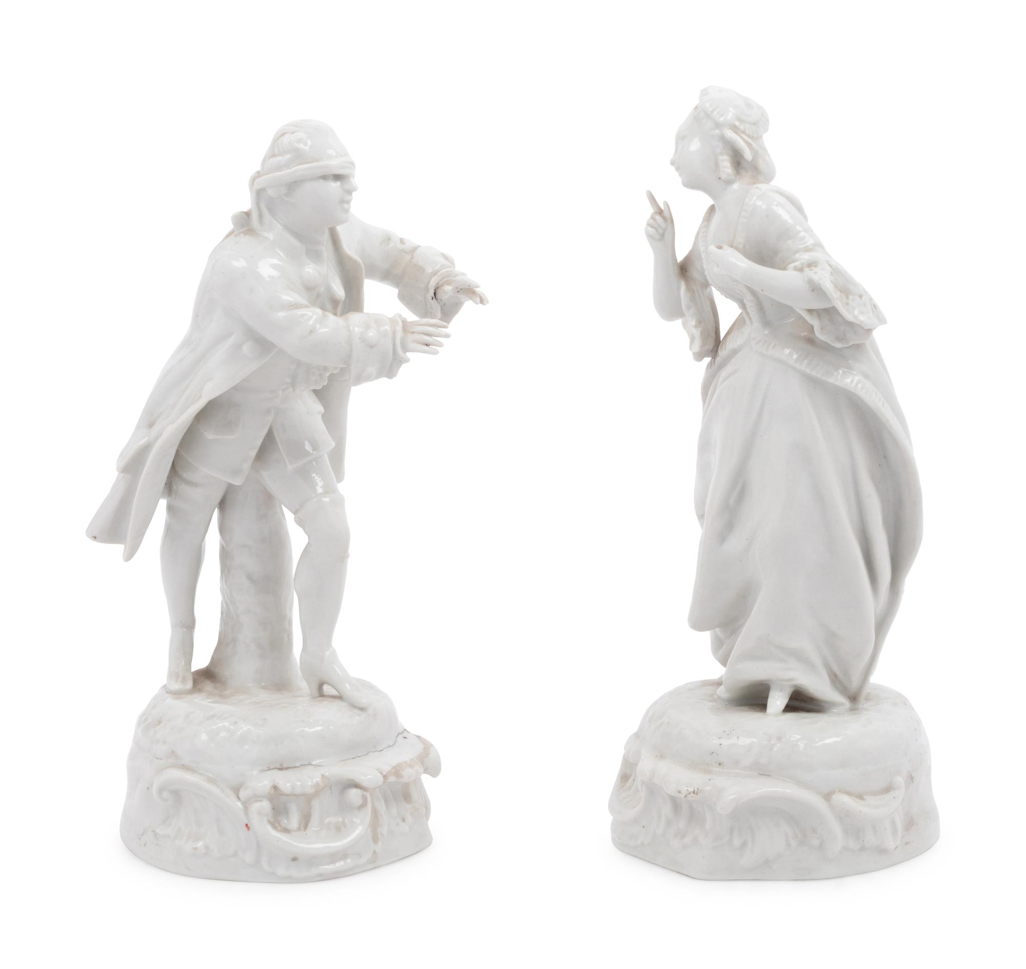 A Pair of French Blanc-de-Chine Hide and Seek Figures