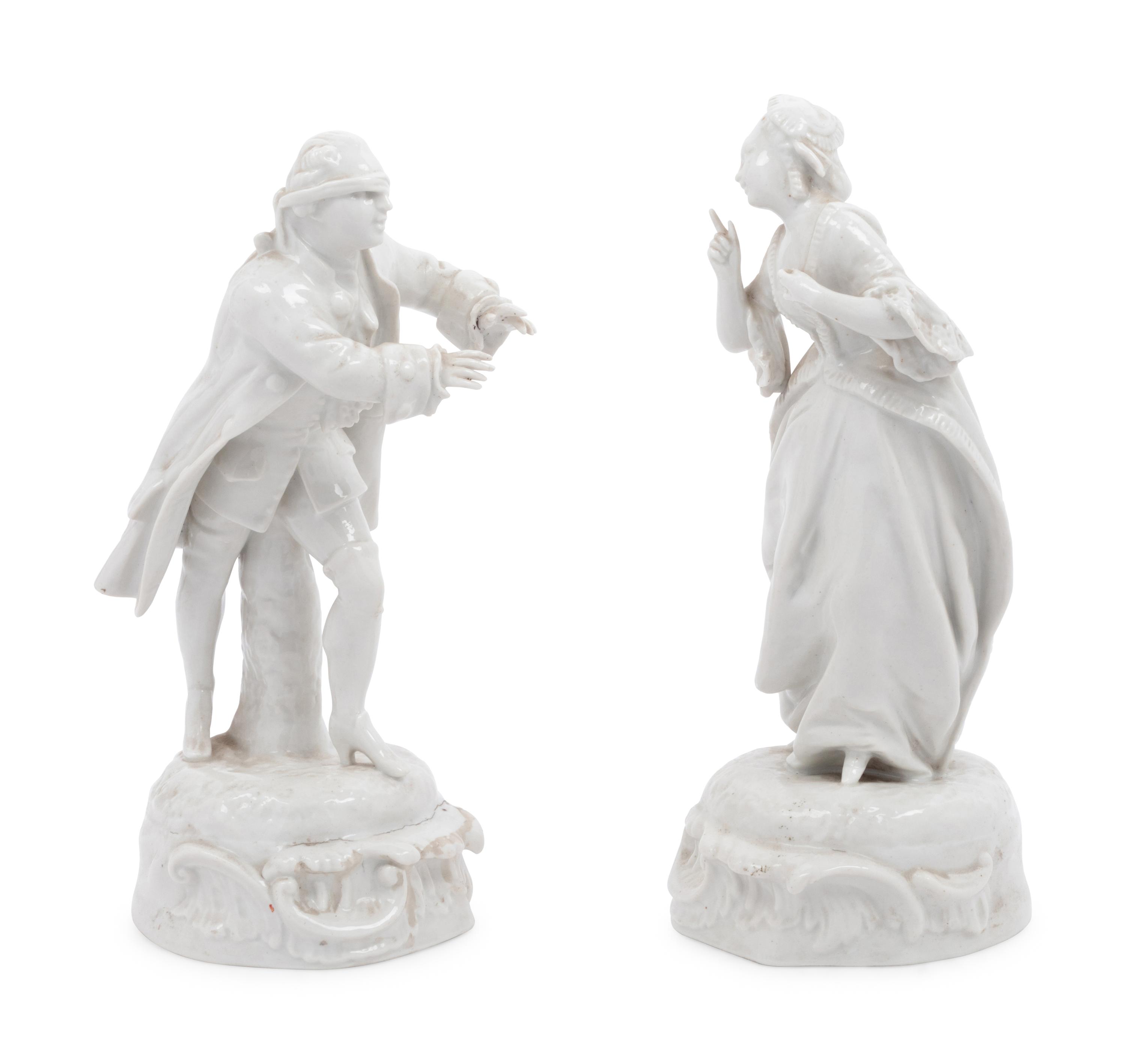 A Pair of French Blanc-de-Chine Hide and Seek Figures