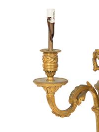 A Pair of Louis XVI Style Gilt Bronze Three-Light Wall Sconces