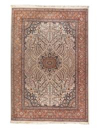 A Qom Wool Rug