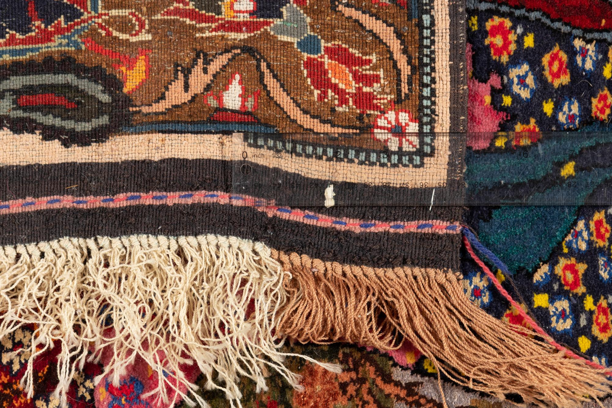 A Tabriz Wool and Silk Signed Pictorial Rug