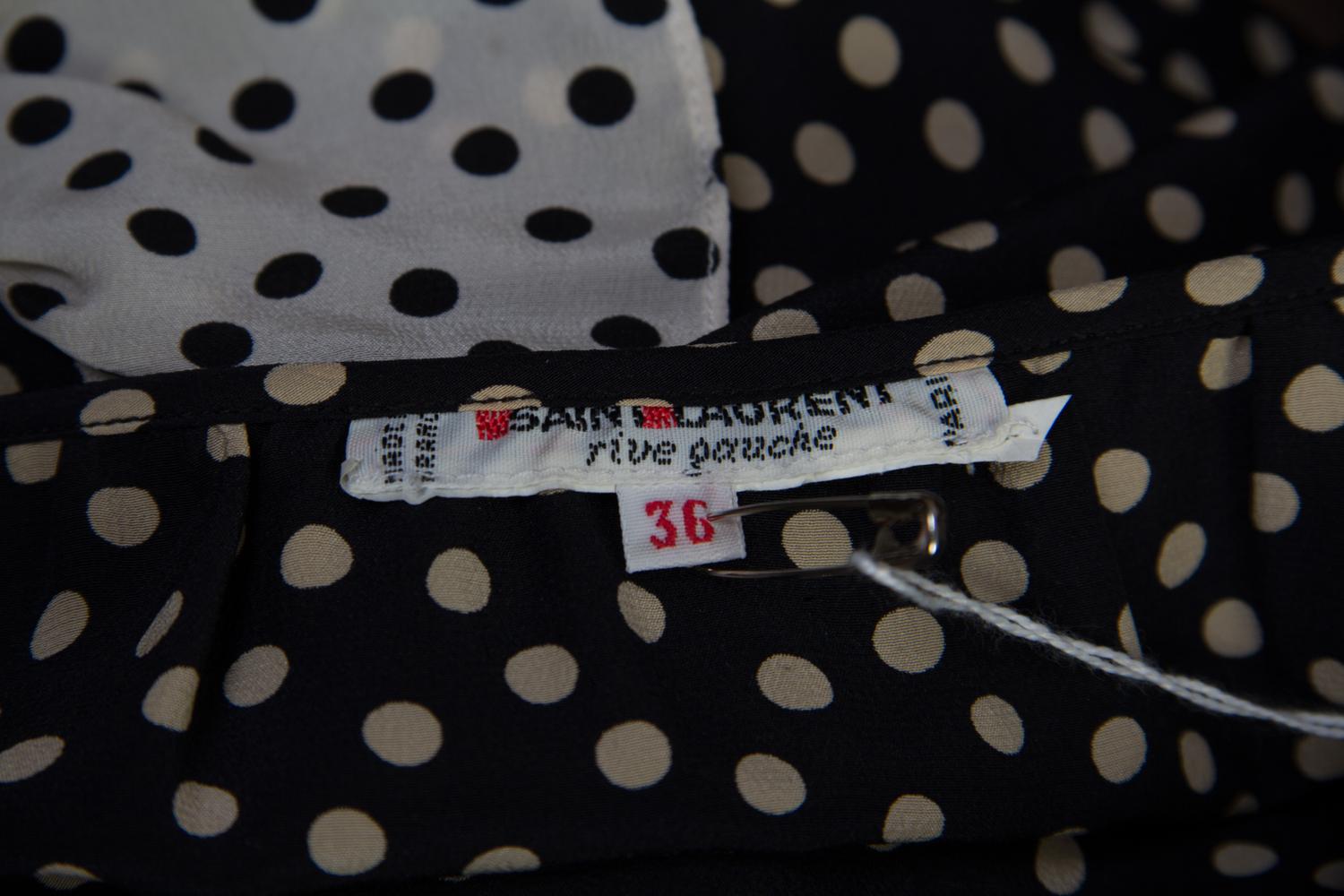 An Yves Saint Laurent Black and Ivory Silk Polka Dot Blouse, Size 36.