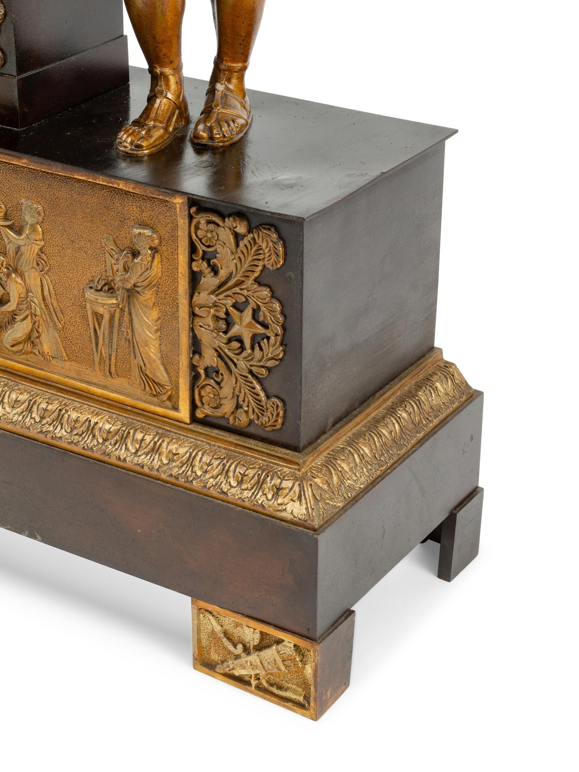 A Louis Philippe Gilt and Patinated Bronze Figural Mantel Clock