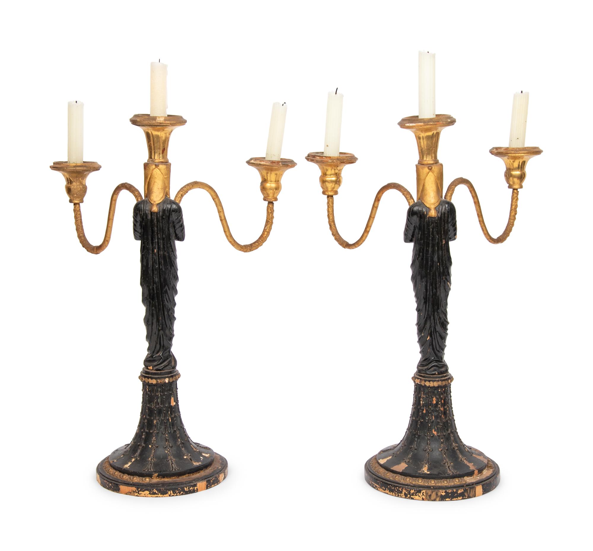 A Pair of Empire Style Painted and Parcel Gilt Candelabra