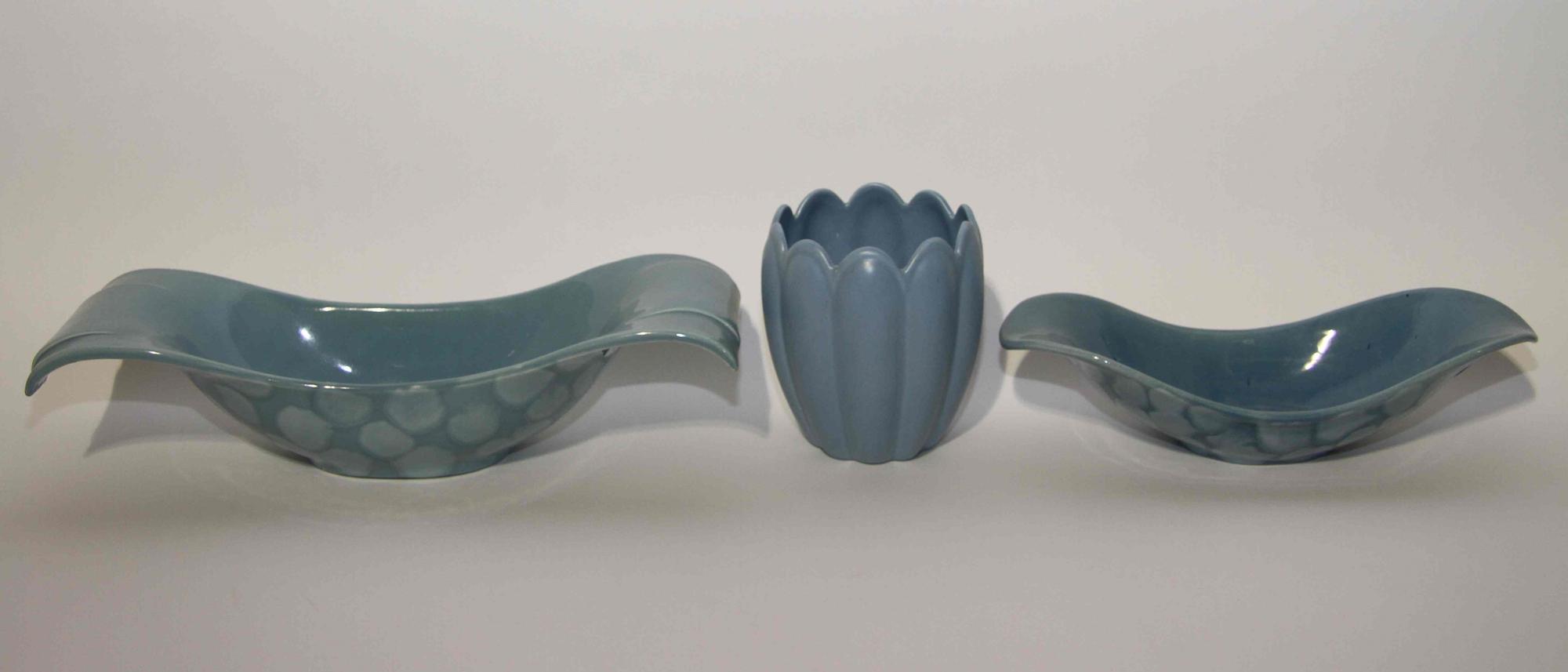 A Group of Nine Haeger Pottery Articles Width of widest 18 3/4 inches.