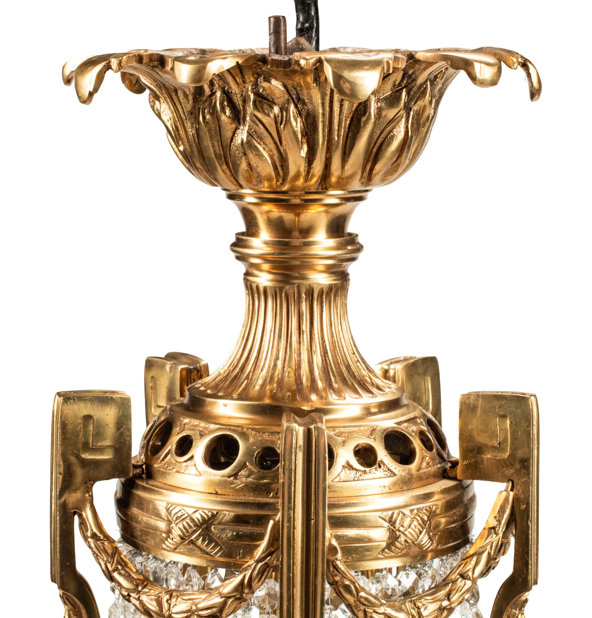 A French Neoclassical Style Gilt Bronze and Glass Ten-Light Chandelier
