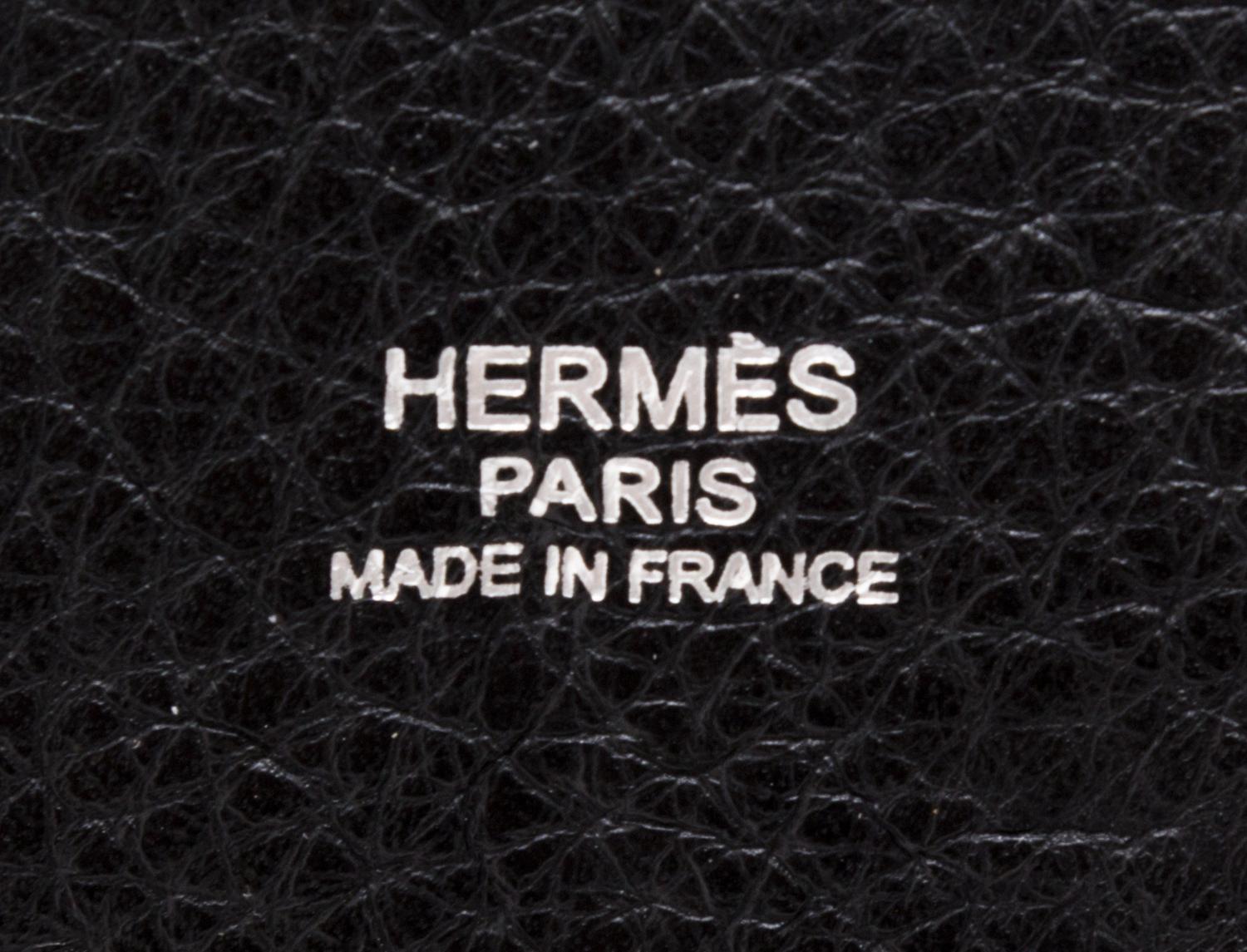 An Hermes Noir Taurillon Clemence Mangeoire PM Handbag, 10" x 8" x 5.5".