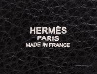 An Hermes Noir Taurillon Clemence Mangeoire PM Handbag, 10" x 8" x 5.5".
