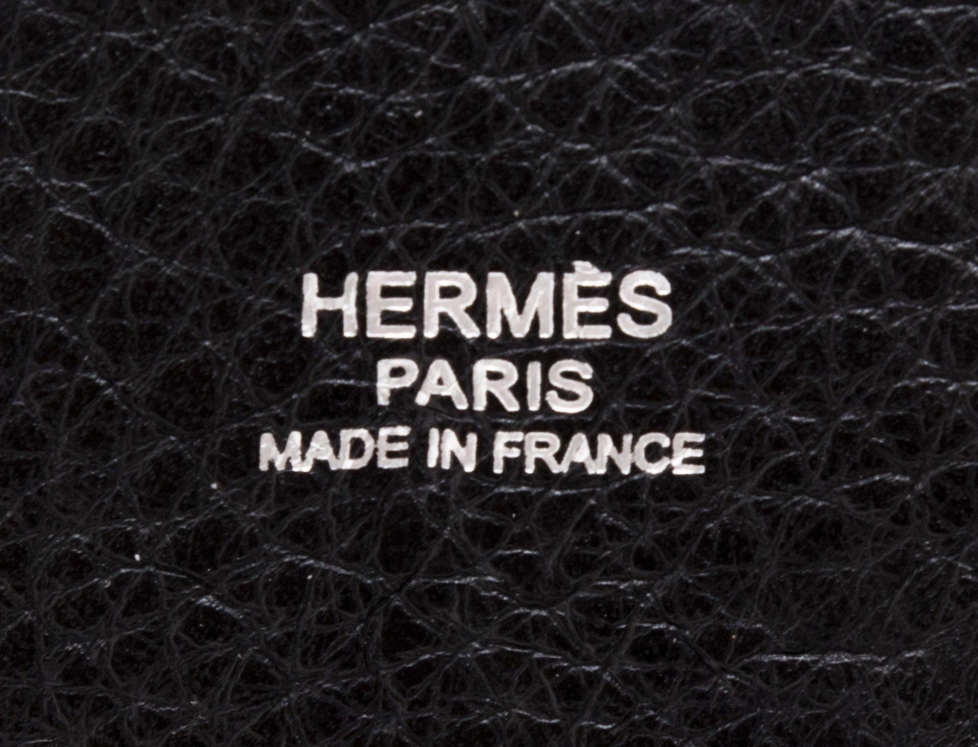 An Hermes Noir Taurillon Clemence Mangeoire PM Handbag, 10" x 8" x 5.5".