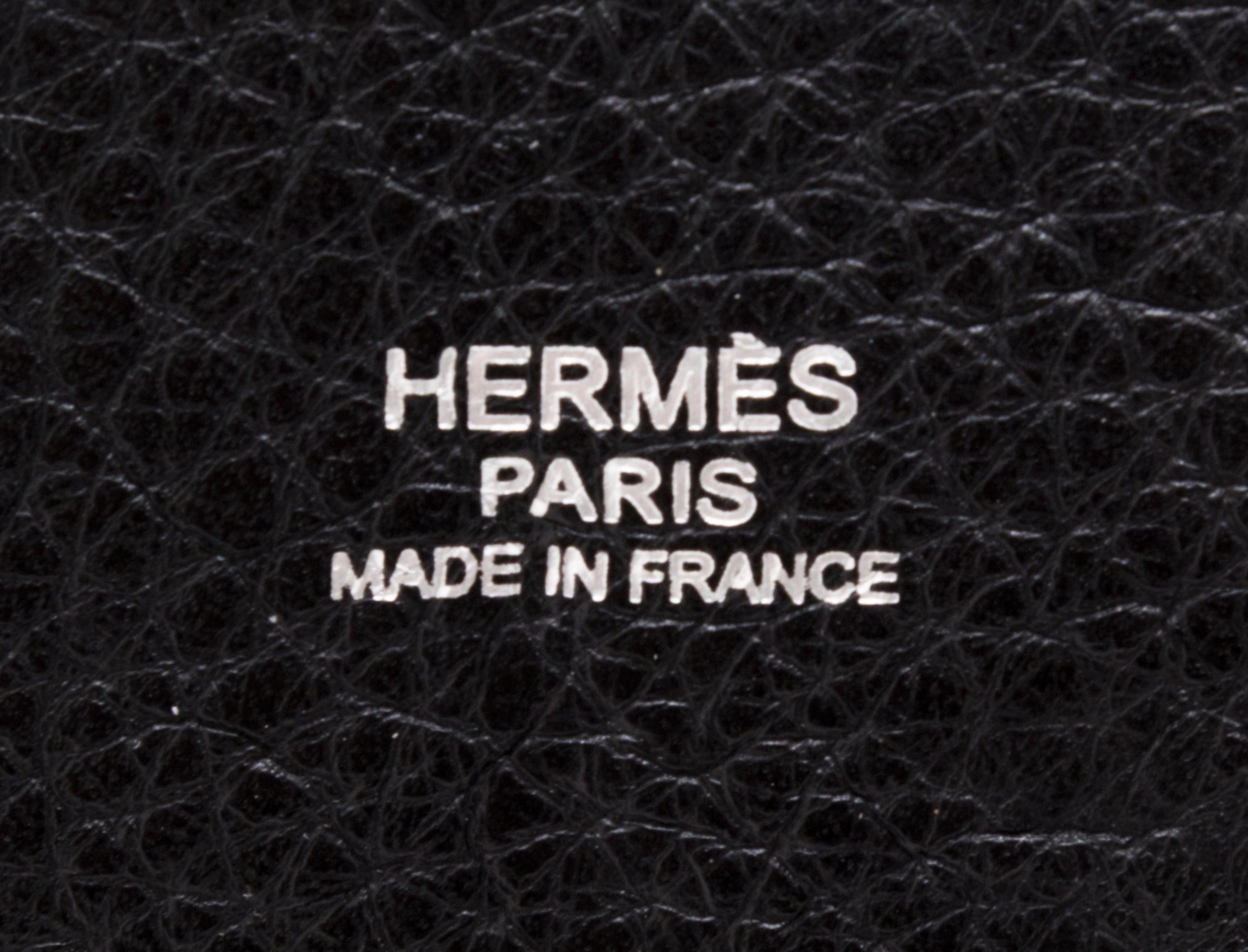 An Hermes Noir Taurillon Clemence Mangeoire PM Handbag, 10" x 8" x 5.5".