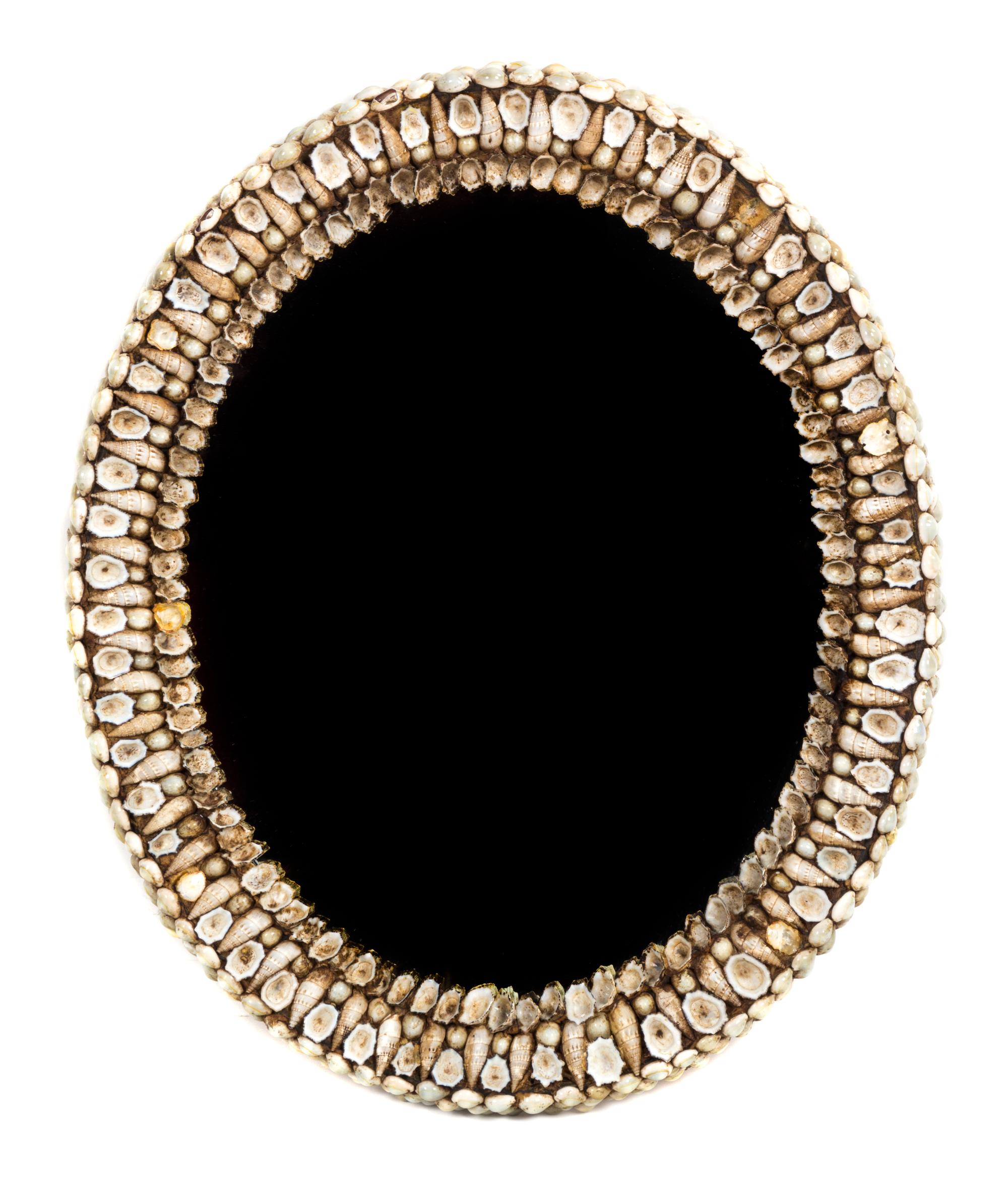 A Shell Encrusted Oval Mirror Height 24 inches. — 20TH CENTURY