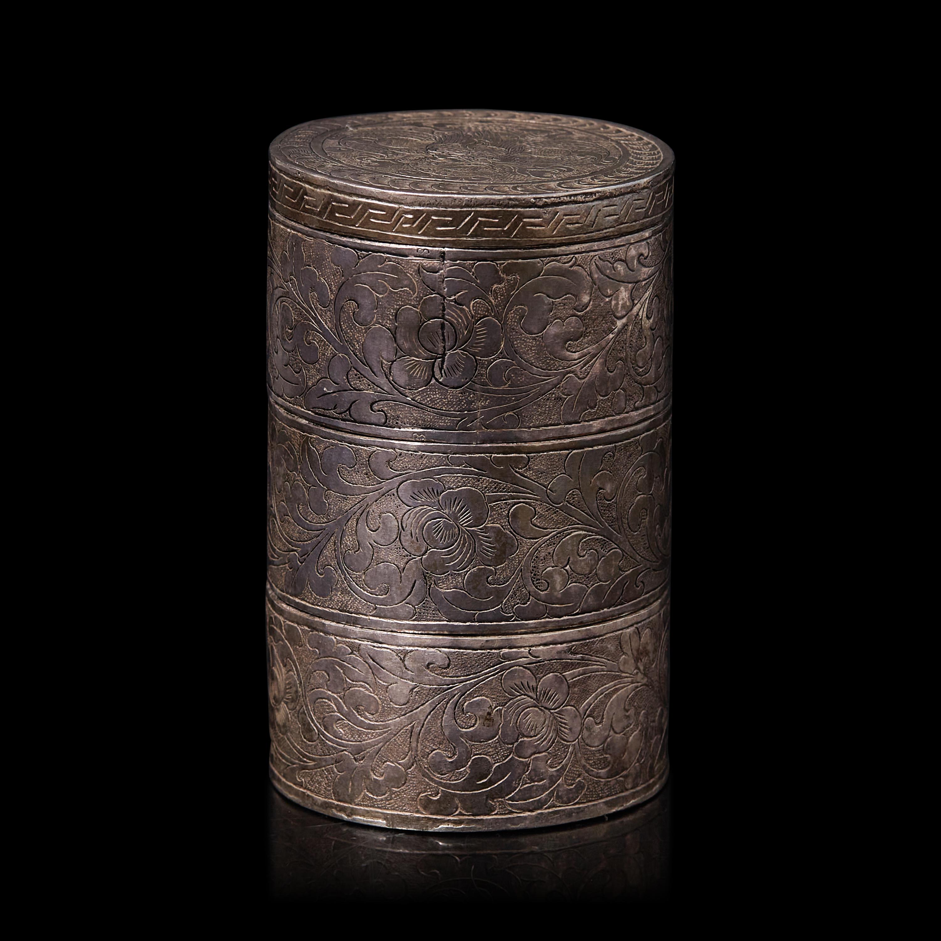 A Small Chinese Silver Tiered Box, Late Qing Dynasty 清晚期 銀鏨花套盒