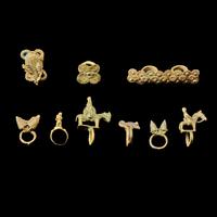 A Group of 9 West African Brass Rings