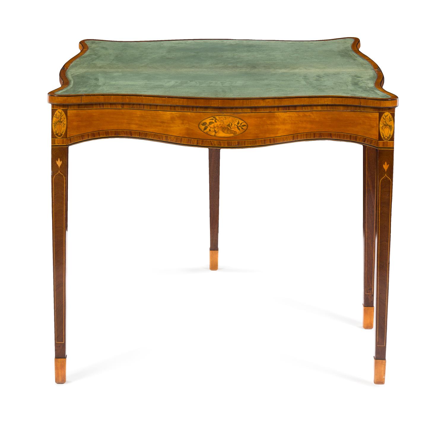 A George III Marquetry and Satinwood Inlaid Mahogany Game Table Height 29 1/2 x width 34 3/4 x depth 14 3/4 inches (closed). — LATE 18TH CENTURY