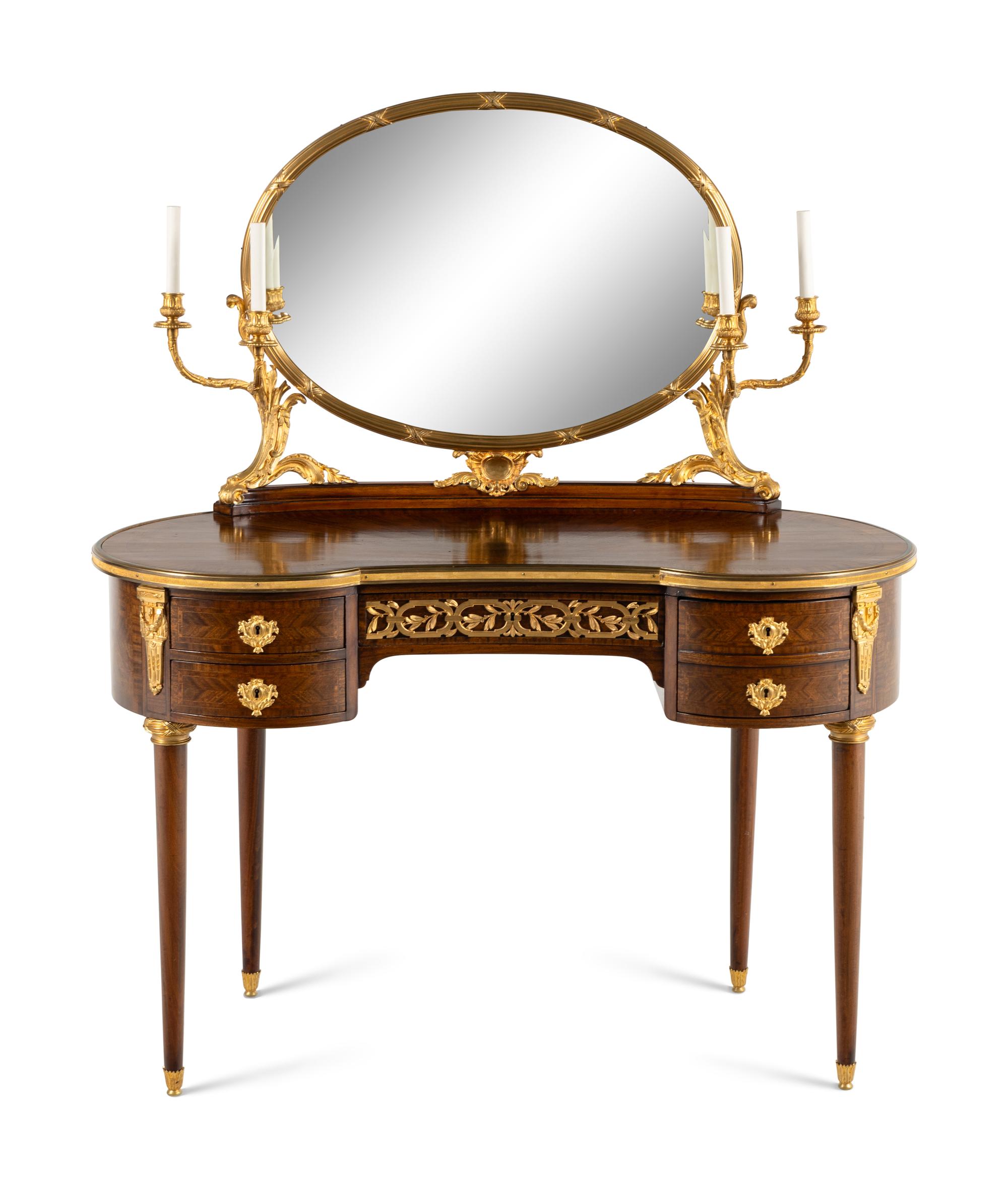 A Louis XVI Style Gilt Bronze Mounted Mahogany Dressing Table and Mirror