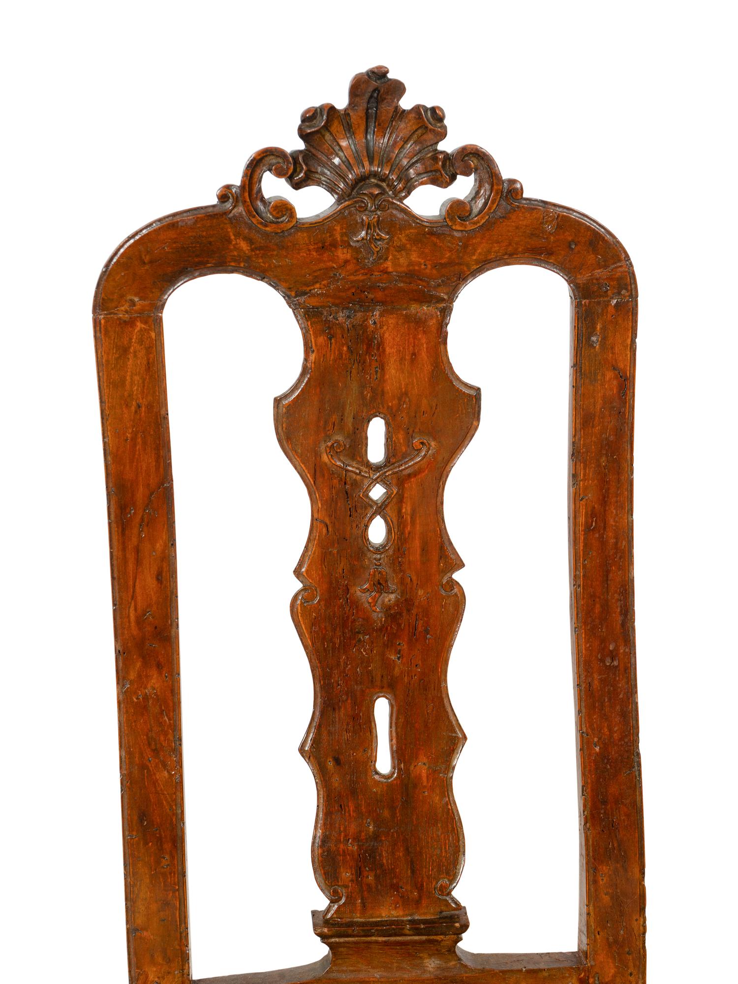A Pair of Portuguese Carved Walnut Side Chairs