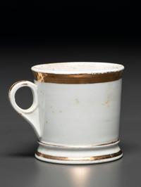 A Porcelain Occupational Shaving Mug Depicting a Bushel of Oysters