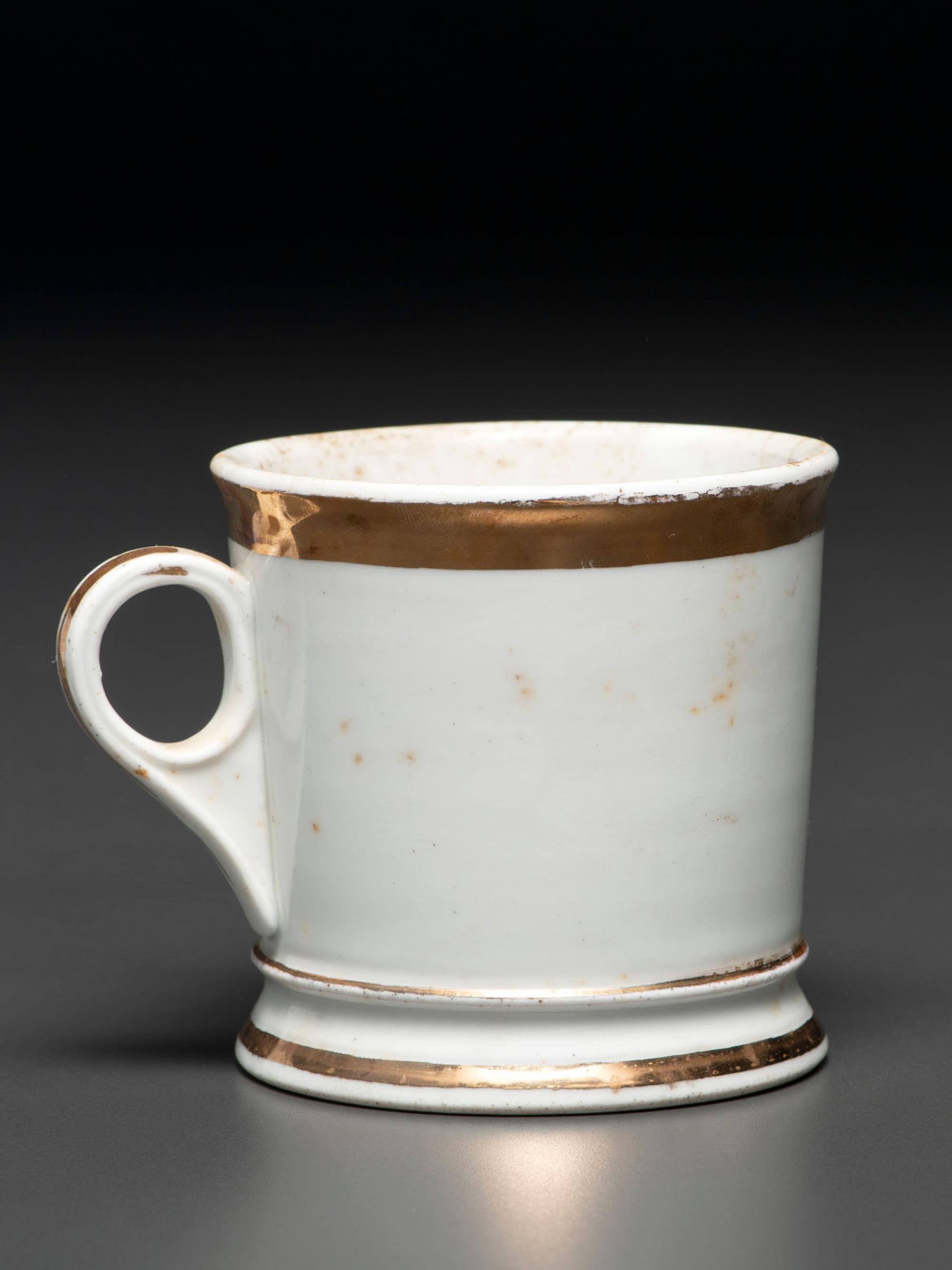 A Porcelain Occupational Shaving Mug Depicting a Bushel of Oysters
