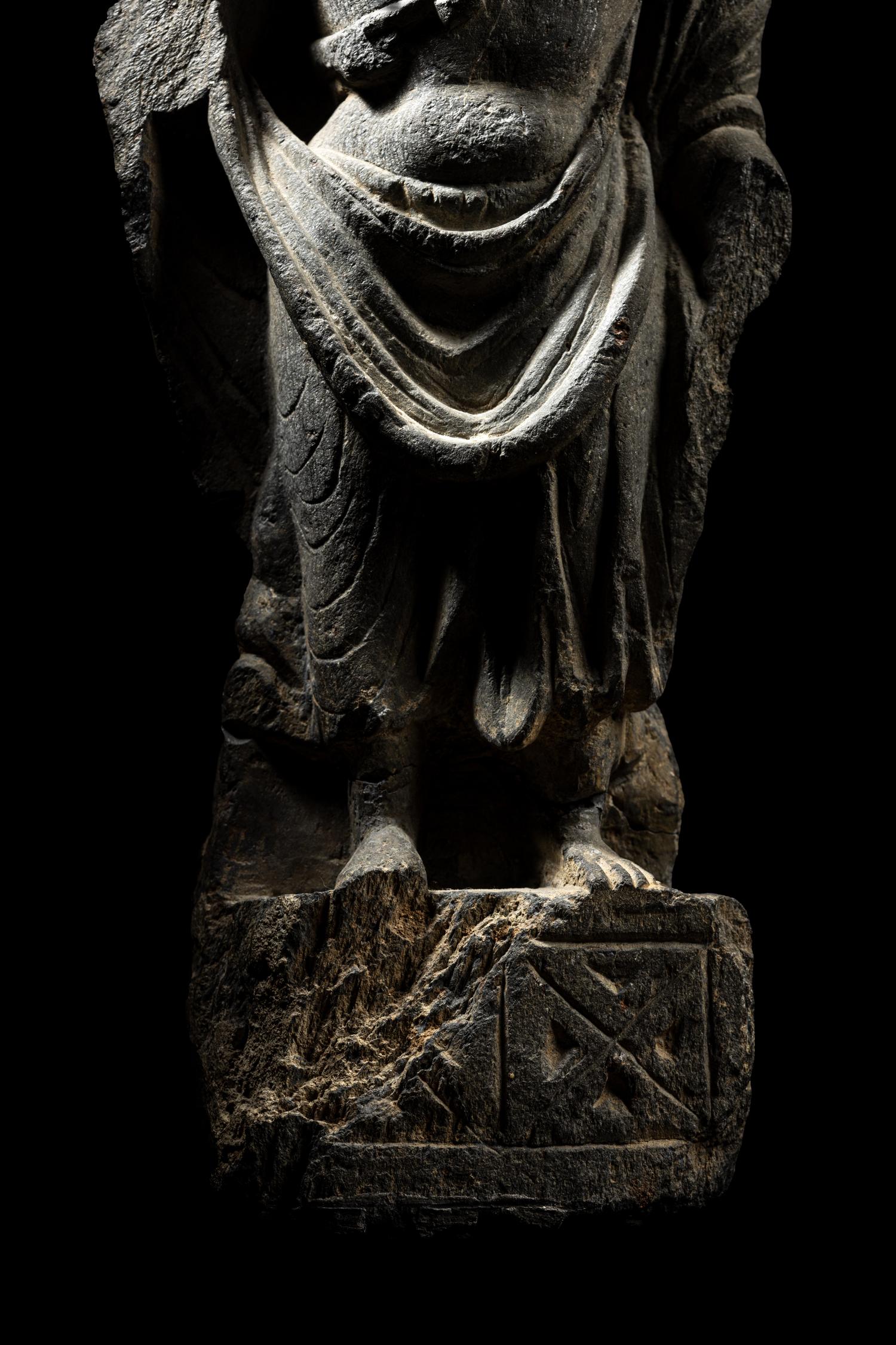 A Gandharan Grey Schist Figure of Maitreya