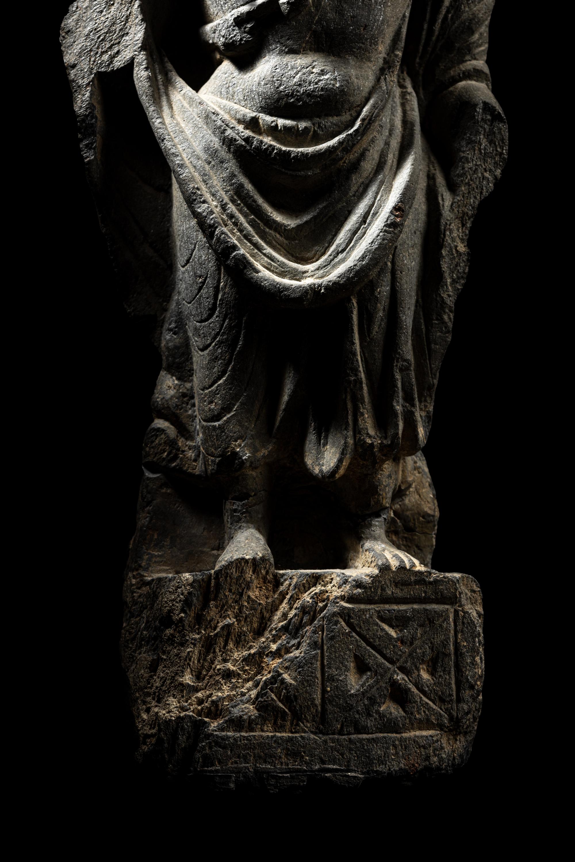 A Gandharan Grey Schist Figure of Maitreya
