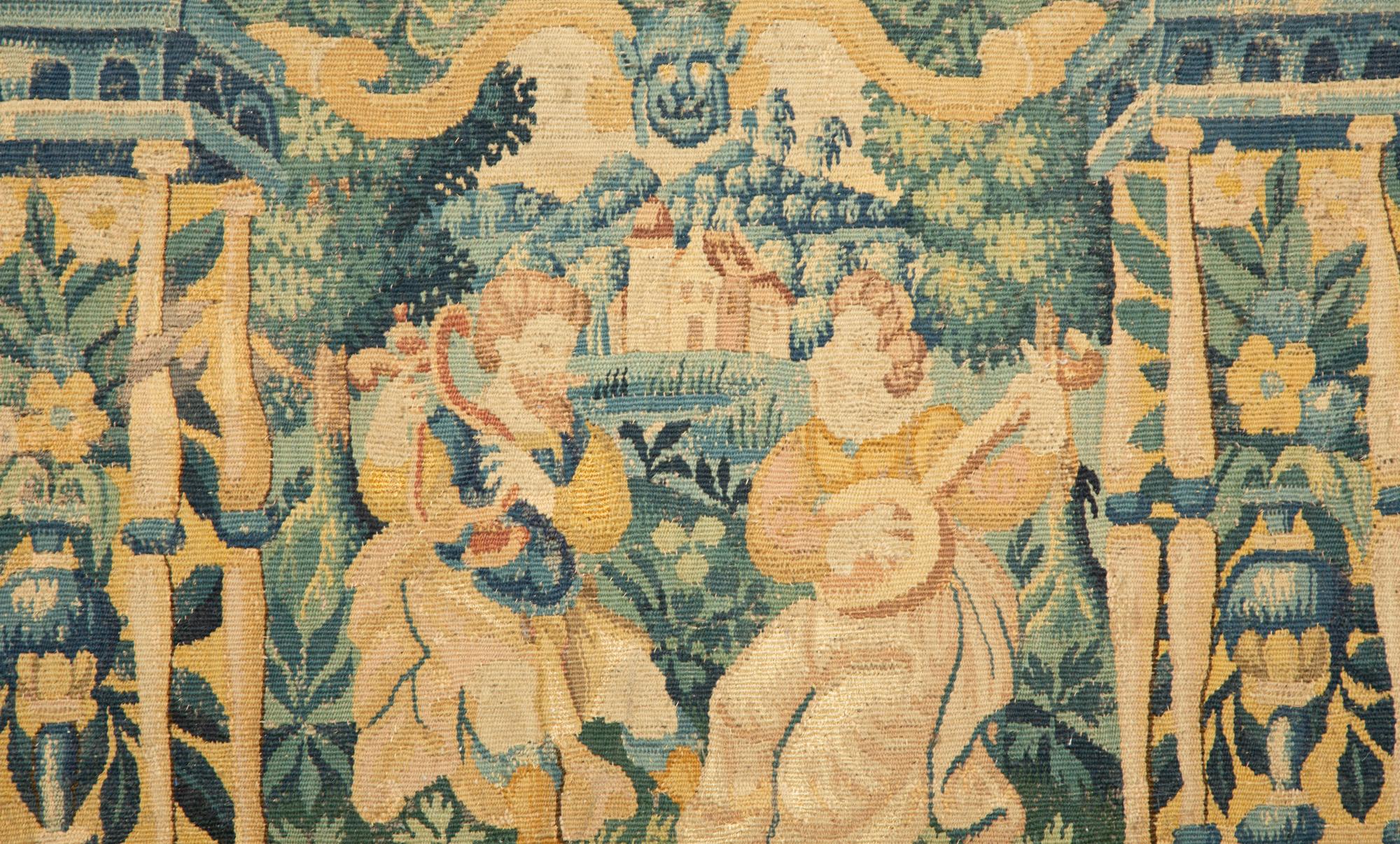 A Jacobean Style Walnut Bench with Tapestry Upholstery