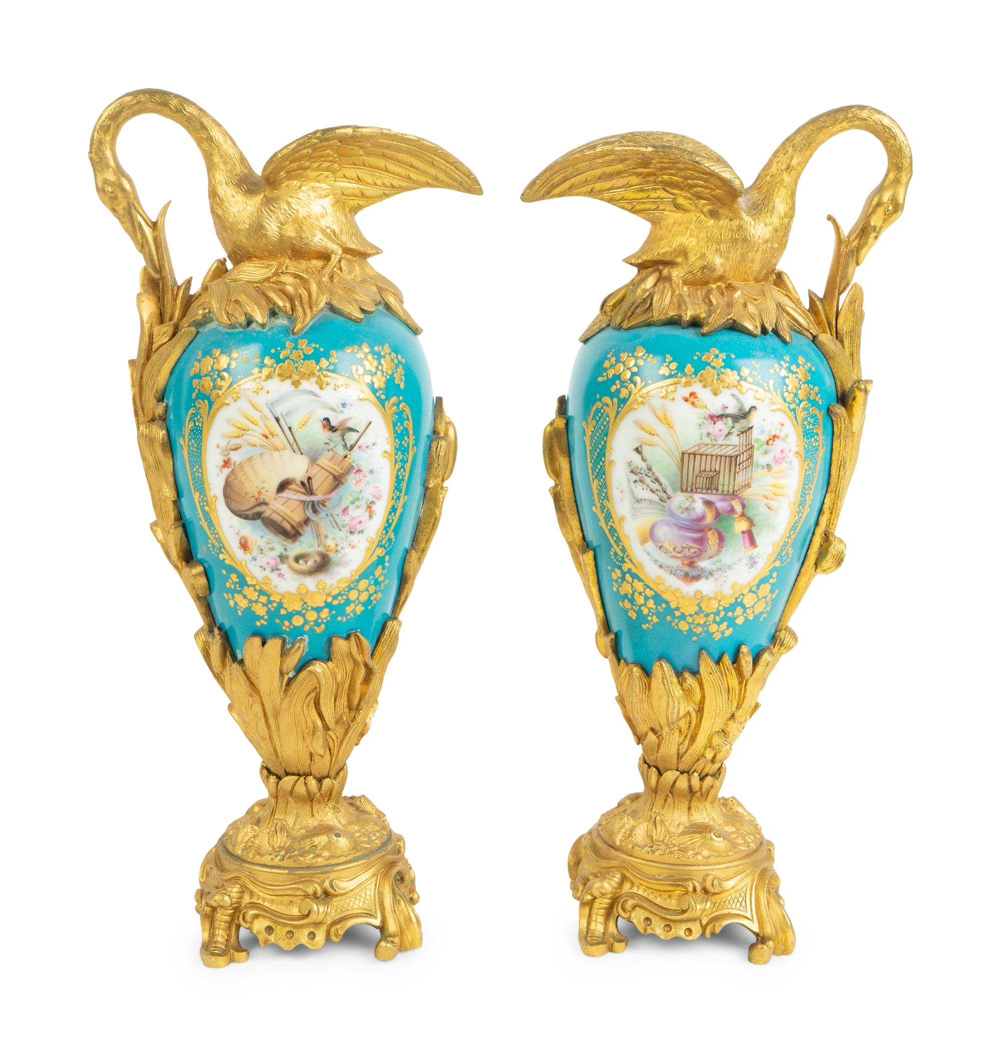 A Pair of Gilt Bronze Mounted Sevres Style Porcelain Ewers — 19TH CENTURY