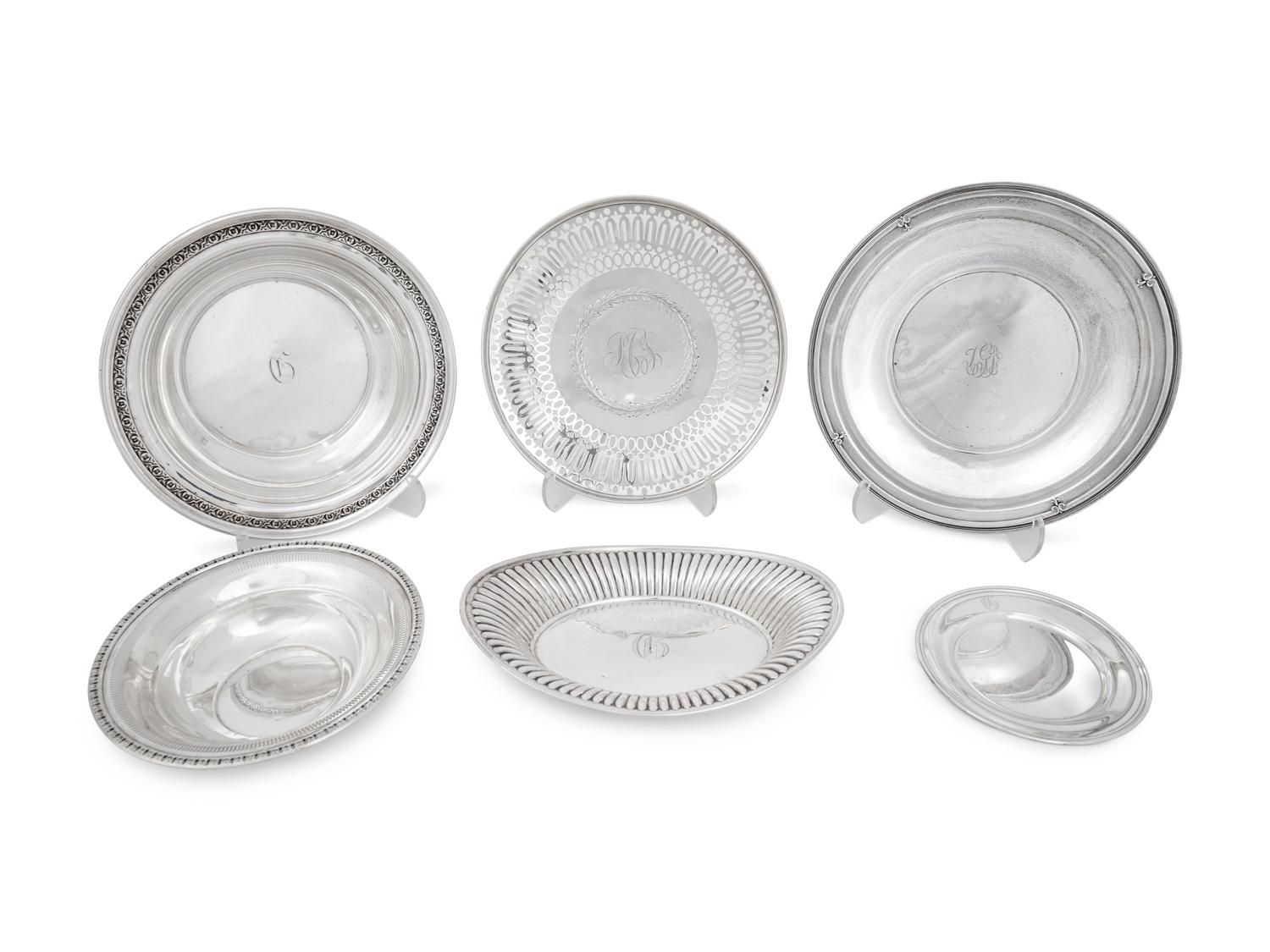 Thirteen Silver Plates and Platters