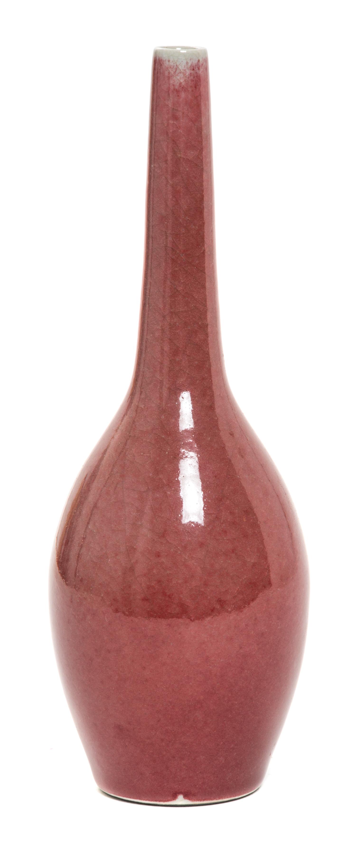 A Peach-Bloom Glazed Porcelain Bottle Vase Height 8 1/2 inches.