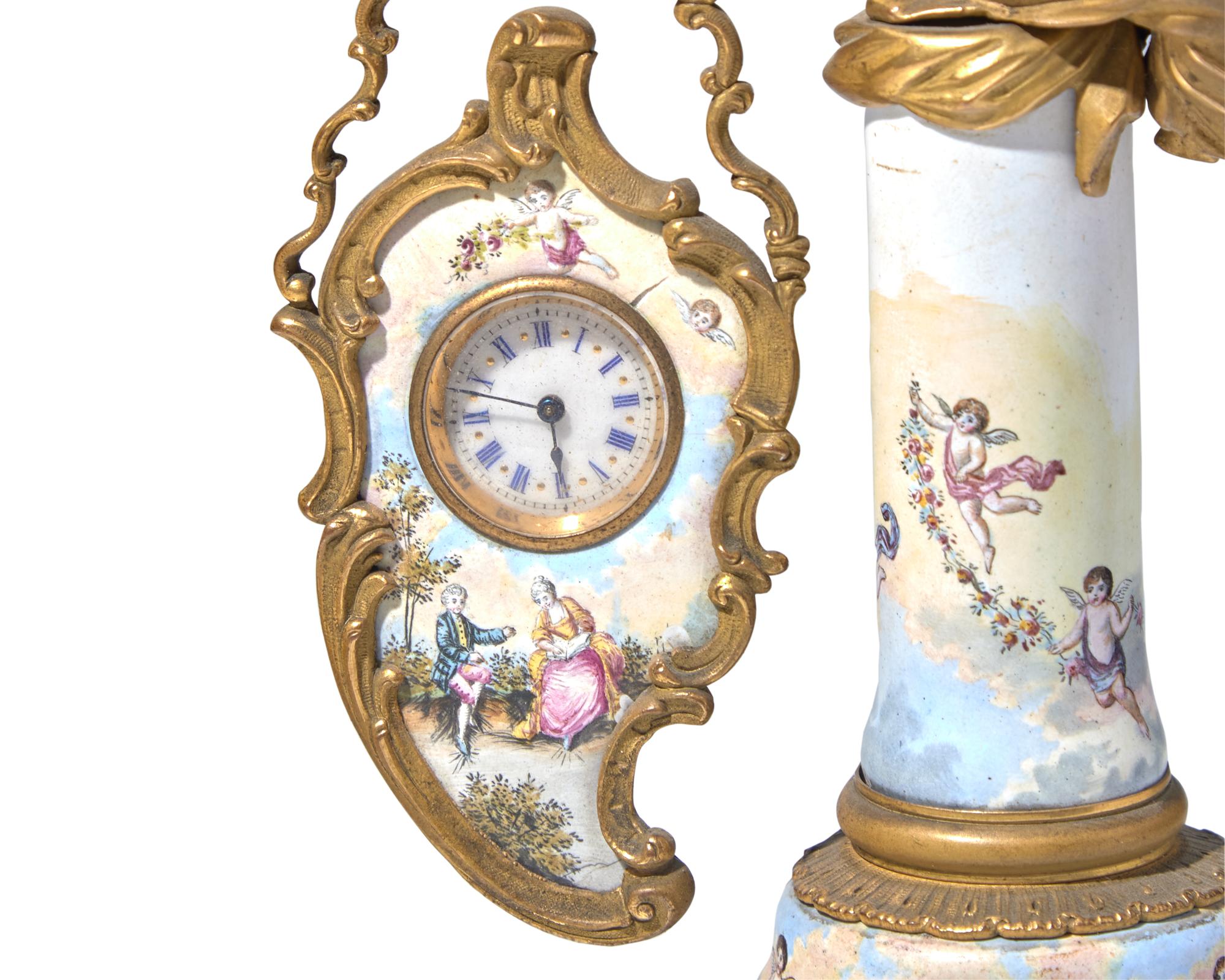 A Viennese miniature gilt bronze and enamel clock pendule, late 19th century