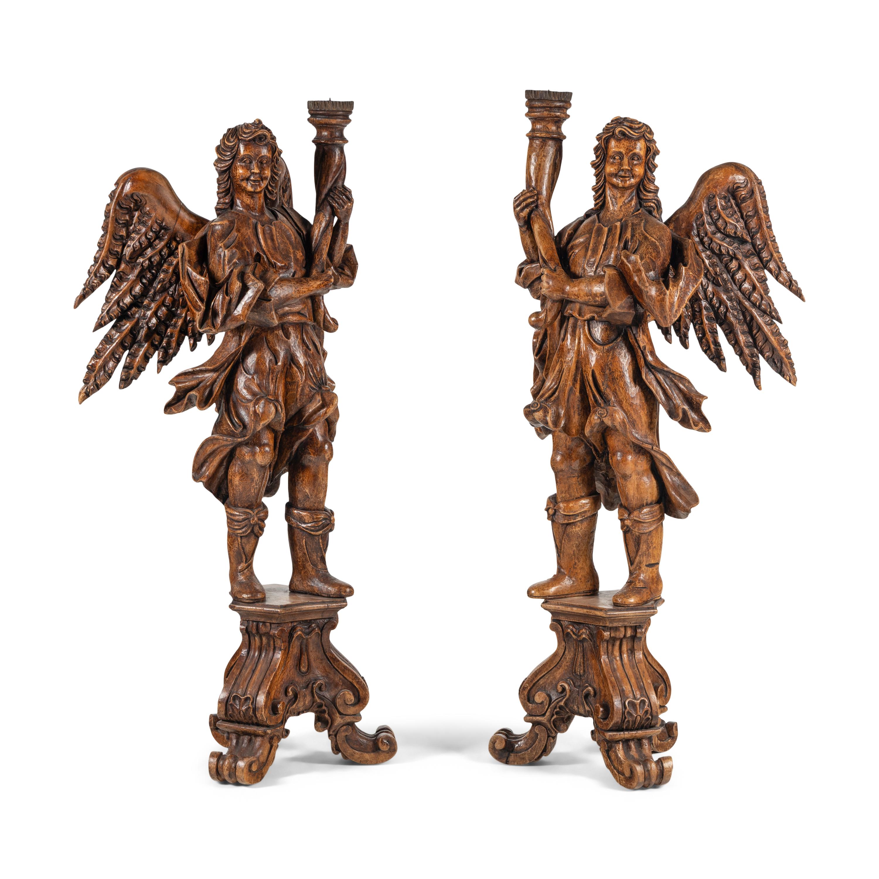 A Pair of Monumental Carved Walnut Figural Torchères