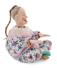 A German Porcelain "Nodder" Figure