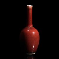 A Small Chinese Copper Red Glazed Cabinet Vase, 18th/Early 19th Century 清中期 祭紅釉小長頸瓶