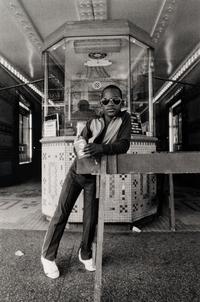 A Boy in Front of the Lowe's 125th Street Movie Theatre, 1976 (printed 2012)