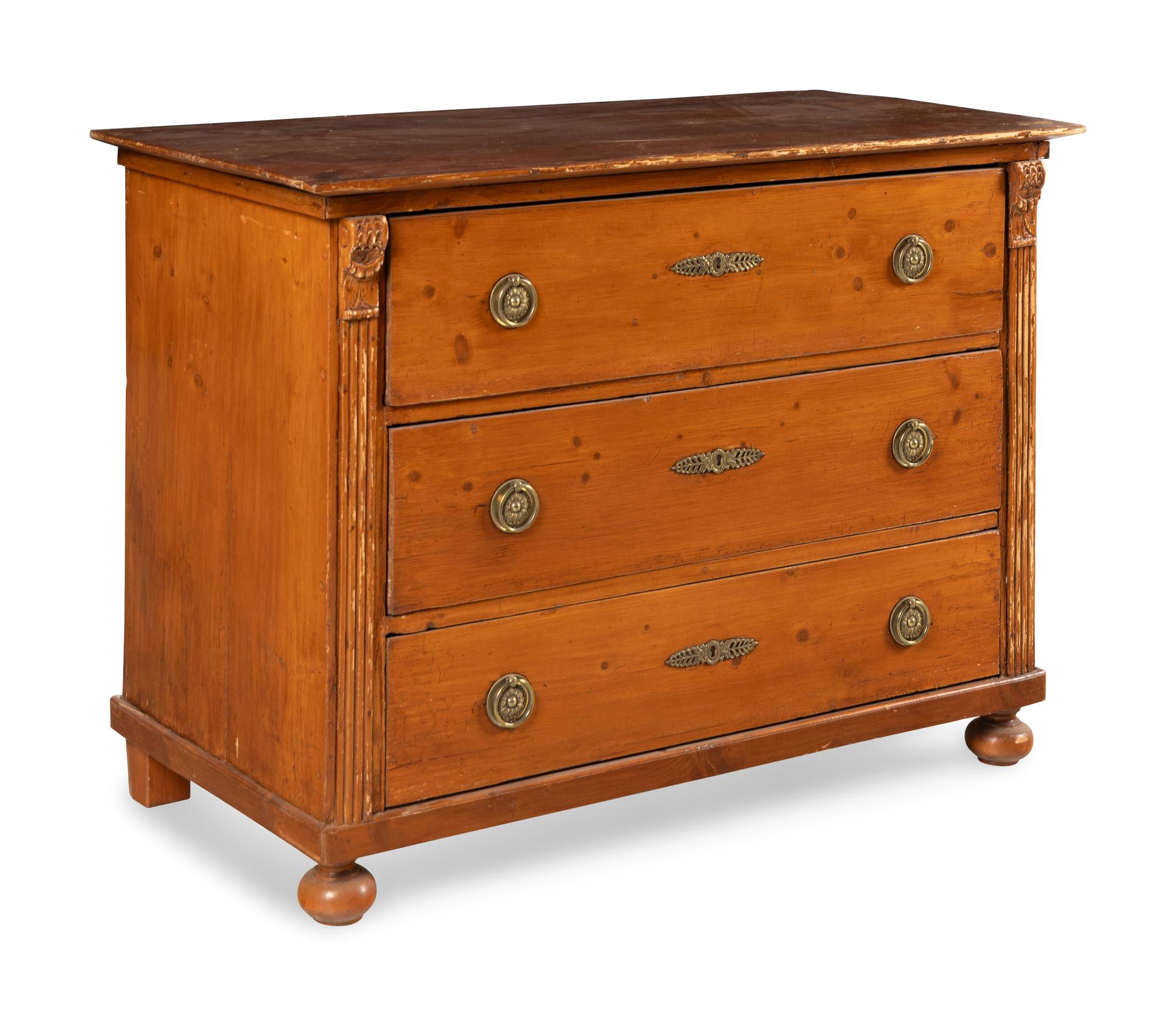 A Continental Grain-Painted Chest of Drawers
